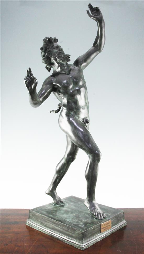 After the antique. A modern green patinated bronze model of a dancing faun, 32.5in.